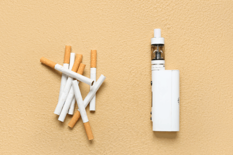 Dentist in Aldershot examining patient for smoking-related oral health damage at Aldershot Village Dental